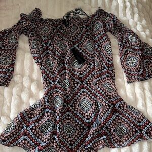 Size small multicolor printed baby doll top with 3/4 sleeves